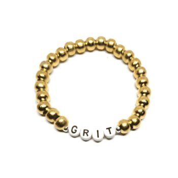 ZORA GRIT word bead bracelet with gold-tone metal beads