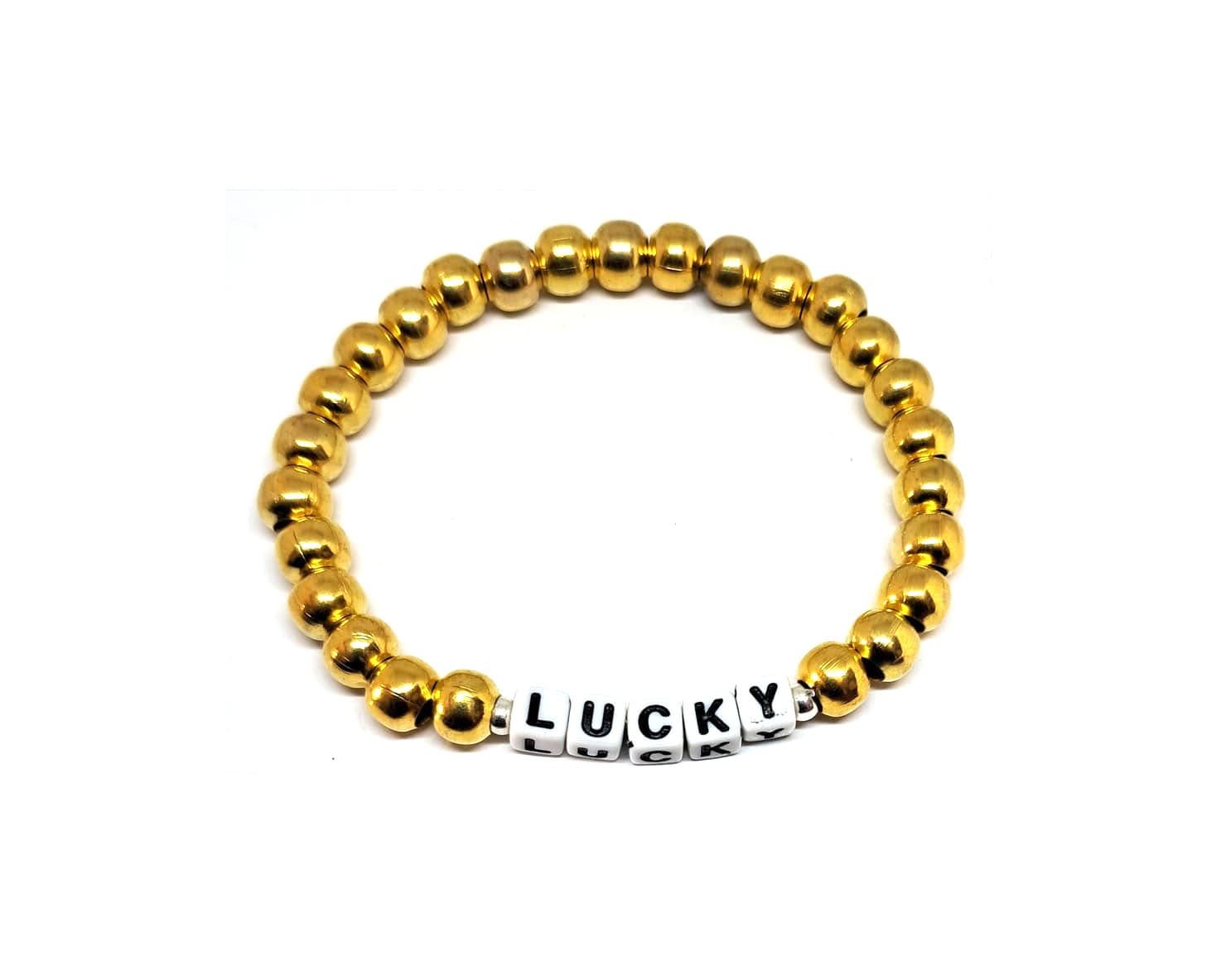 ZW-IN-006 ZORA LUCKY word bead bracelet with gold-tone metal beads ZORA LUCKY word bead bracelet with gold-tone metal beads